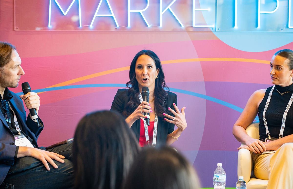 A panellist speaking into a microphone on the Ecommerce Marketplace stage