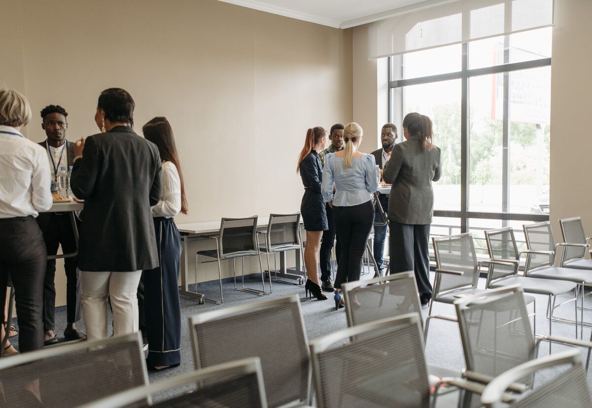 An audience seated at a conference session