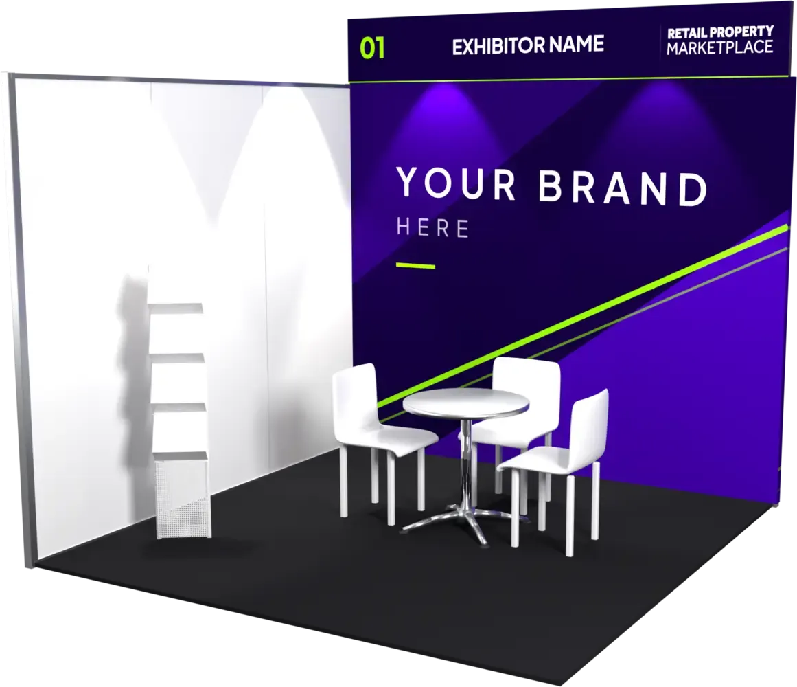 A single meeting area stand: branded back wall, meeting table with three chairs and a brochure rack