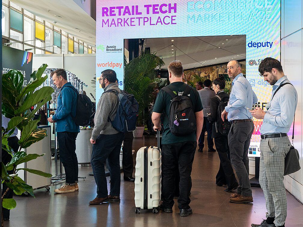 Retailers in conversation with technology providers on the event floor