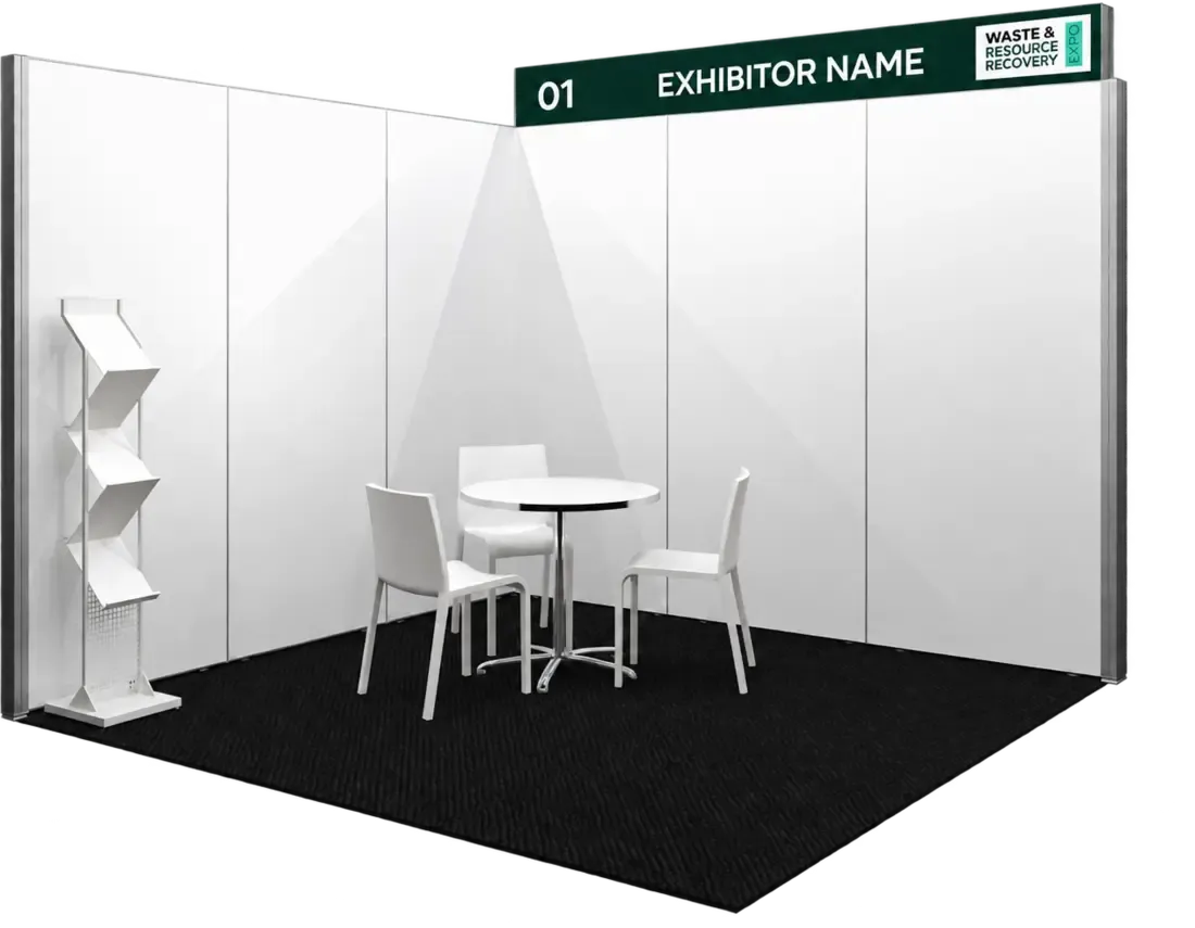 A 3m x 3m corner shell scheme stand with plain white walls, a round table, three chairs and a brochure rack